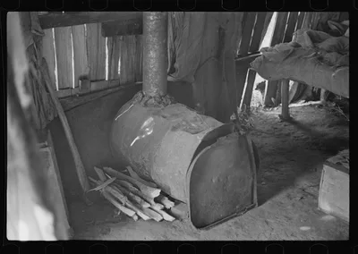 Stove made out of old oil can, squatter's camp, Arkansas, 1935