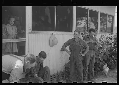 Waiting for dinner during wheat harvest, central Ohio, 1938