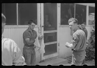 [Untitled photo, possibly related to: Washing up for dinner during…, Ohio, 1938