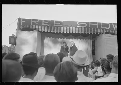 Sideshows at the July 4th celebration, Ashville, Ohio (see general…, 1938