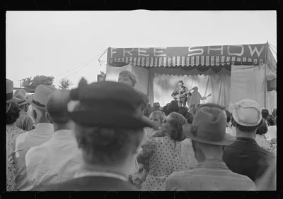 [Untitled photo, possibly related to: Ashville, Ohio. Sideshows at…, 1938