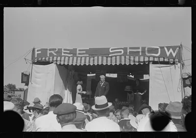 [Untitled photo, possibly related to: Ashville, Ohio. Sideshows at…, 1938