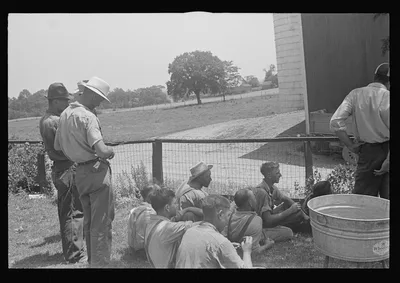 [Untitled photo, possibly related to: Part of threshing crew, waiting…, Ohio, 1938
