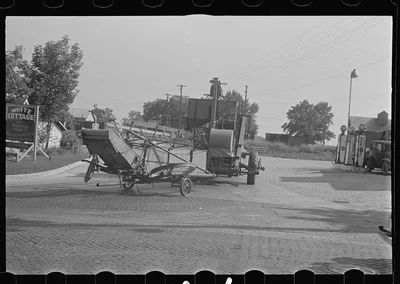 [Untitled photo, possibly related to: Moving combine and tractor,…, Ohio, 1938