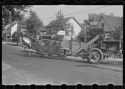 [Untitled photo, possibly related to: Moving combine and tractor,…, Ohio, 1938