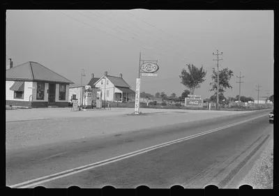 [Untitled photo, possibly related to: Signs along Route 40, central…, Ohio, 1938