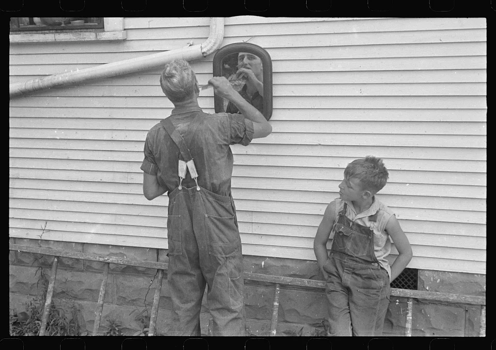 Getting ready for dinner during wheat harvest, central Ohio, 1938