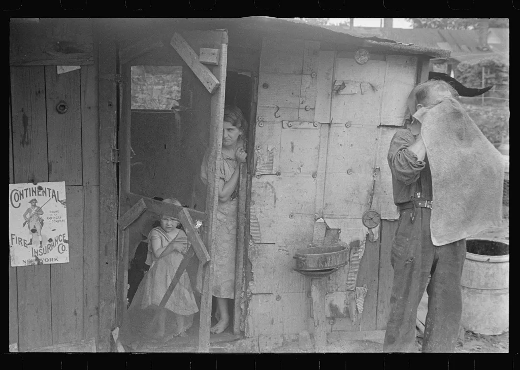 [Untitled photo, possibly related to: Child of ex-farmer now on…, Ohio, 1938