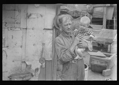 Ex-farmer and child, now on W.P.A. (Work Projects Administration),…, Ohio, 1938