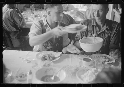 Dinner during wheat harvest time, central Ohio, 1938