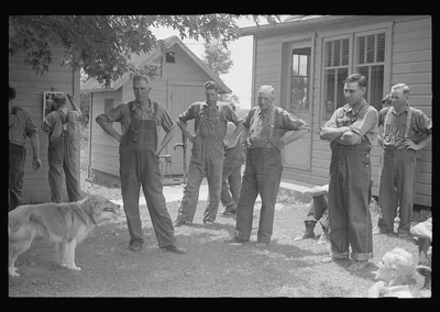 Waiting around before dinner during wheat harvest, central Ohio, 1938