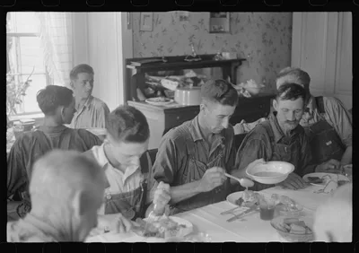 Dinner during wheat harvest time, central Ohio, 1938