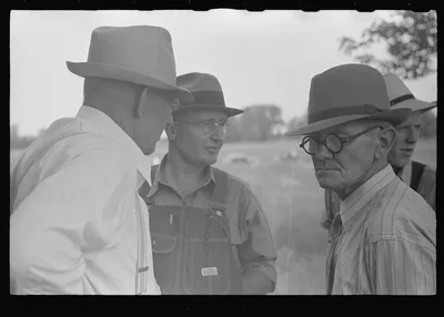 Spectators at farmland auction, New Carlisle [i.e. Marysville], Ohio, 1938