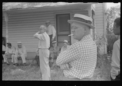 Spectators at farmland auction, New Carlisle [i.e. Marysville], Ohio, 1938