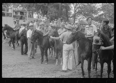 Lineup for pony race at county fair, central Ohio, 1938
