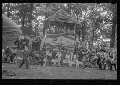 Spectators around judges stand, county fair in central Ohio, 1938