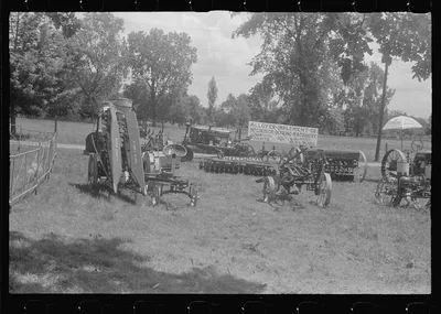 Farm machinery display at county fair, central Ohio, 1938