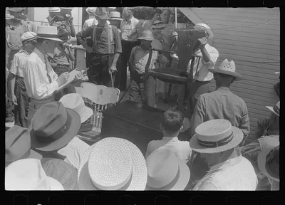 Auctioning off household effects, public auction, central Ohio, 1938