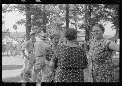 [Untitled photo, possibly related to: Spectators at sideshow, county…, Ohio, 1938