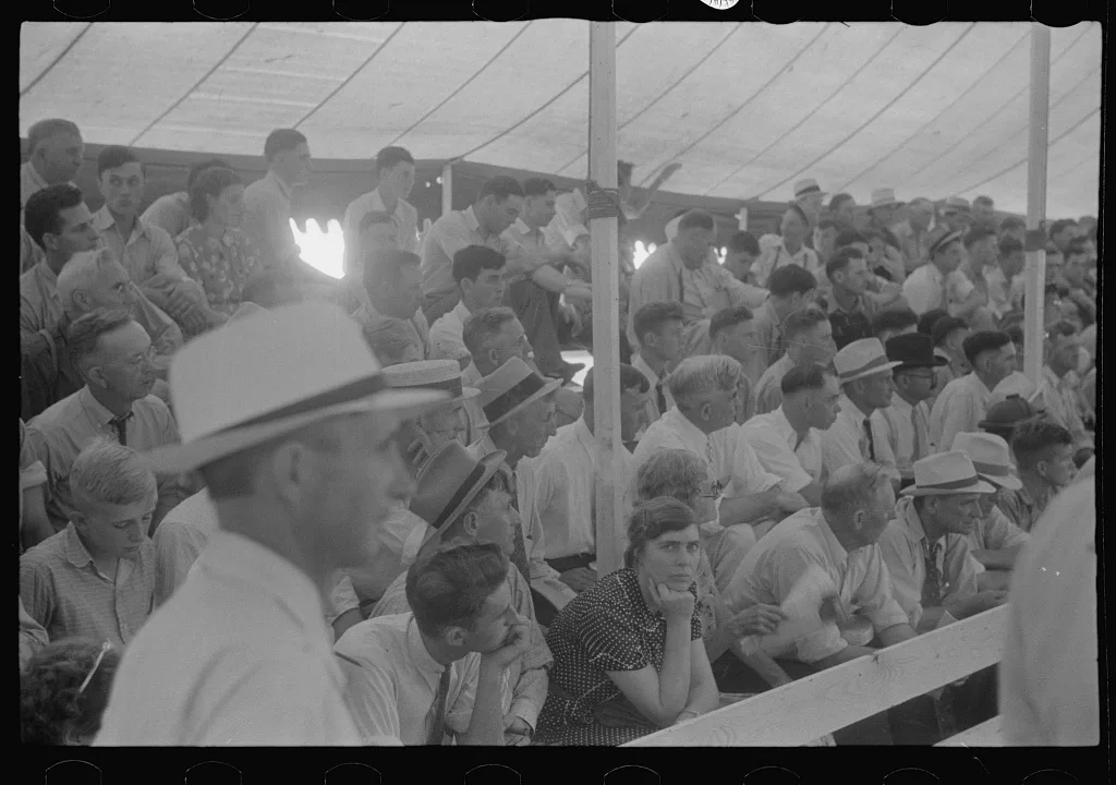 [Untitled photo, possibly related to: Spectators at sideshow, county…, Ohio, 1938