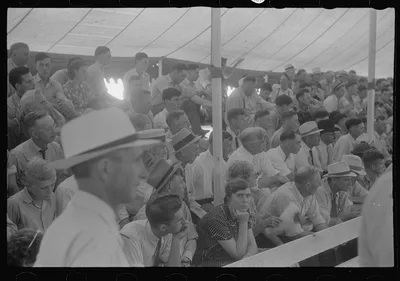 [Untitled photo, possibly related to: Spectators at sideshow, county…, Ohio, 1938