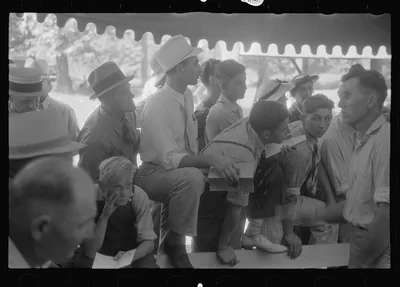 [Untitled photo, possibly related to: Spectators at sideshow, county…, Ohio, 1938